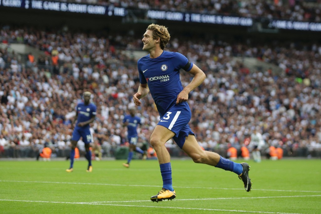 Chelsea's Spanish defender Marcos Alonso celebrates scoring their second goal during the English Premier League football match between Tottenham Hotspur and Chelsea at Wembley Stadium in London, on August 20, 2017. / AFP PHOTO / Daniel LEAL-OLIVAS / RESTRICTED TO EDITORIAL USE. No use with unauthorized audio, video, data, fixture lists, club/league logos or 'live' services. Online in-match use limited to 75 images, no video emulation. No use in betting, games or single club/league/player publications. / (Photo credit should read DANIEL LEAL-OLIVAS/AFP/Getty Images)
