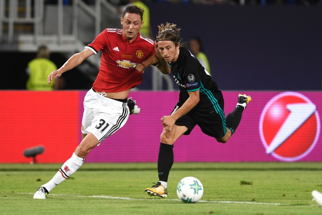 Manchester United's Serbian midfielder Nemanja Matic (L) vies with Real Madrid's Croatian midfielder Luka Modric during the UEFA Super Cup football match between Real Madrid and Manchester United on August 8, 2017, at the Philip II Arena in Skopje. / AFP PHOTO / Nikolay DOYCHINOV (Photo credit should read NIKOLAY DOYCHINOV/AFP/Getty Images)