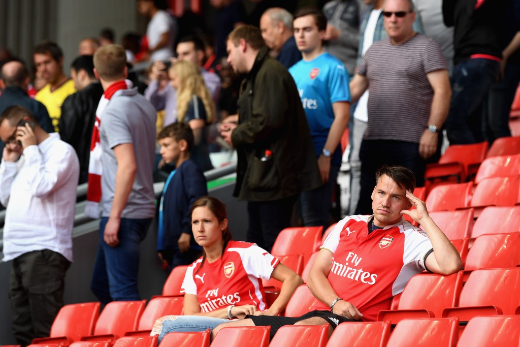 LIVERPOOL, ENGLAND - AUGUST 27: Arsenal fans are dejected after the Premier League match between Liverpool and Arsenal at Anfield on August 27, 2017 in Liverpool, England. (Photo by Michael Regan/Getty Images)