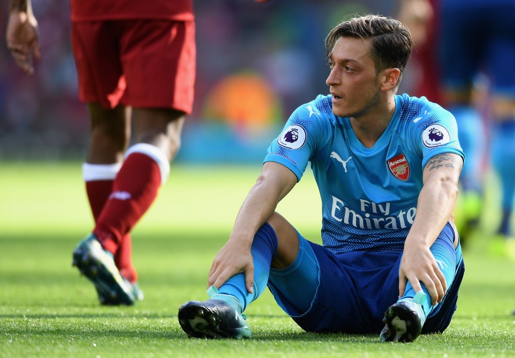 LIVERPOOL, ENGLAND - AUGUST 27: Mesut Ozil of Arsenal reacts during the Premier League match between Liverpool and Arsenal at Anfield on August 27, 2017 in Liverpool, England. (Photo by Michael Regan/Getty Images)