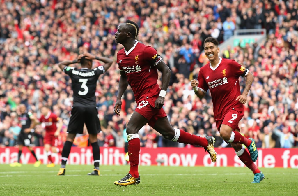LIVERPOOL, ENGLAND - AUGUST 19: Sadio Mane of Liverpool celebrates scoring his sides first goal during the Premier League match between Liverpool and Crystal Palace at Anfield on August 19, 2017 in Liverpool, England. (Photo by Jan Kruger/Getty Images)