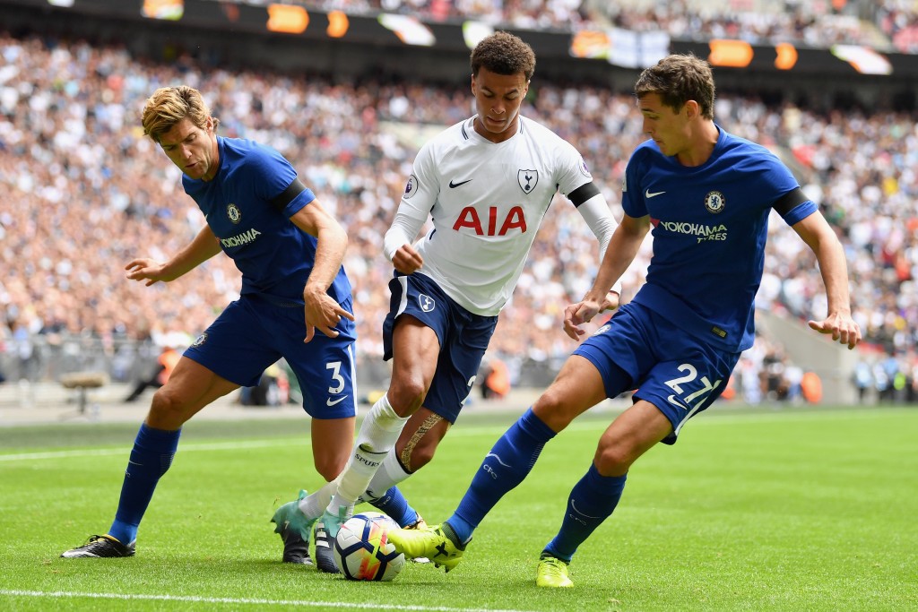 LONDON, ENGLAND - AUGUST 20: Dele Alli of Tottenham Hotspur attempts to get past Andreas Christensen of Chelsea and Marcos Alonso of Chelsea during the Premier League match between Tottenham Hotspur and Chelsea at Wembley Stadium on August 20, 2017 in London, England. (Photo by Justin Setterfield/Getty Images)