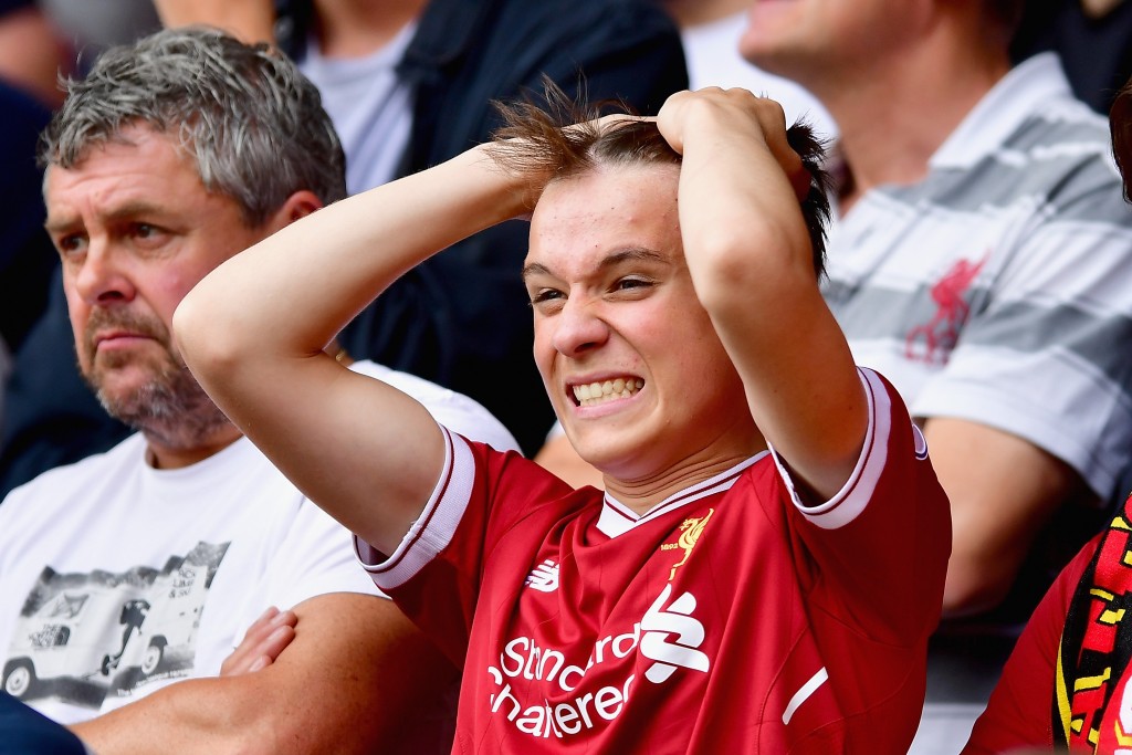 WATFORD, ENGLAND - AUGUST 12: A Liverpool fan reacts during the Premier League match between Watford and Liverpool at Vicarage Road on August 12, 2017 in Watford, England. (Photo by Alex Broadway/Getty Images)