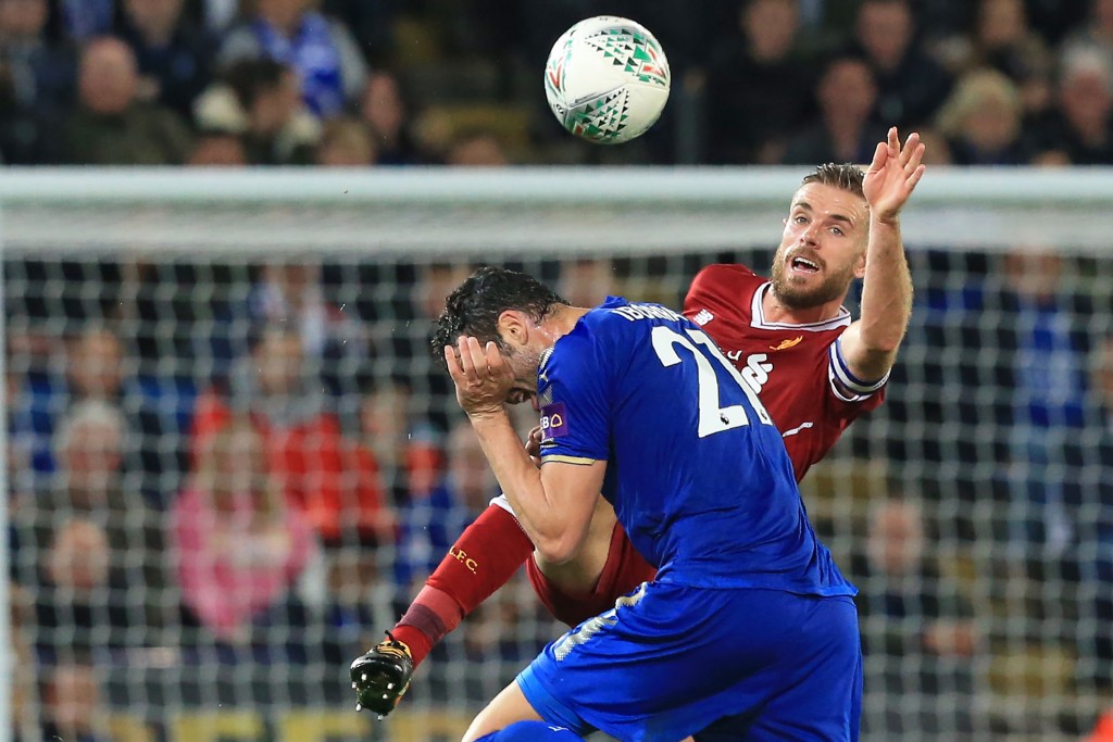 Leicester City's Spanish midfielder Vicente Iborra (L) vies with Liverpool's English midfielder Jordan Henderson (R) during the English League Cup third round football match between Leicester City and Liverpool at King Power Stadium in Leicester, central England on September 19, 2017. / AFP PHOTO / Lindsey PARNABY / RESTRICTED TO EDITORIAL USE. No use with unauthorized audio, video, data, fixture lists, club/league logos or 'live' services. Online in-match use limited to 75 images, no video emulation. No use in betting, games or single club/league/player publications. / (Photo credit should read LINDSEY PARNABY/AFP/Getty Images)
