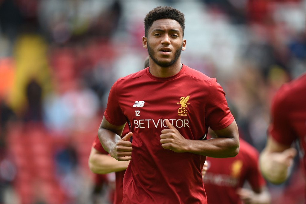 Liverpool's English defender Joe Gomez warm up ahead of the English Premier League football match between Liverpool and Crystal Palace at Anfield in Liverpool, north west England on August 19, 2017. / AFP PHOTO / Oli SCARFF / RESTRICTED TO EDITORIAL USE. No use with unauthorized audio, video, data, fixture lists, club/league logos or 'live' services. Online in-match use limited to 75 images, no video emulation. No use in betting, games or single club/league/player publications. / (Photo credit should read OLI SCARFF/AFP/Getty Images)