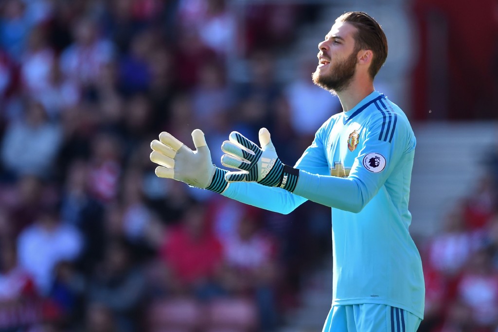 Manchester United's Spanish goalkeeper David de Gea gestures during the English Premier League football match between Southampton and Manchester United at St Mary's Stadium in Southampton, southern England on September 23, 2017. / AFP PHOTO / Glyn KIRK / RESTRICTED TO EDITORIAL USE. No use with unauthorized audio, video, data, fixture lists, club/league logos or 'live' services. Online in-match use limited to 75 images, no video emulation. No use in betting, games or single club/league/player publications. / (Photo credit should read GLYN KIRK/AFP/Getty Images)