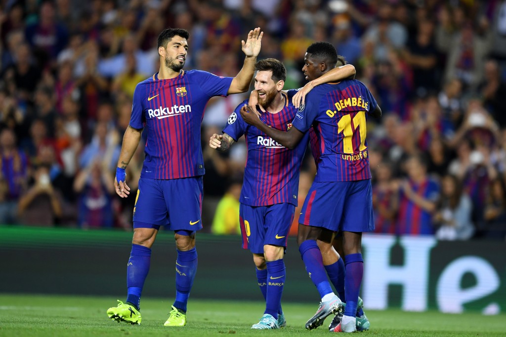BARCELONA, SPAIN - SEPTEMBER 12: Lionel Messi of Barcelona celebrates scoring his sides third goal with Ousmane Dembele of Barcelona and Luis Suarez of Barcelona during the UEFA Champions League Group D match between FC Barcelona and Juventus at Camp Nou on September 12, 2017 in Barcelona, Spain. (Photo by David Ramos/Getty Images)