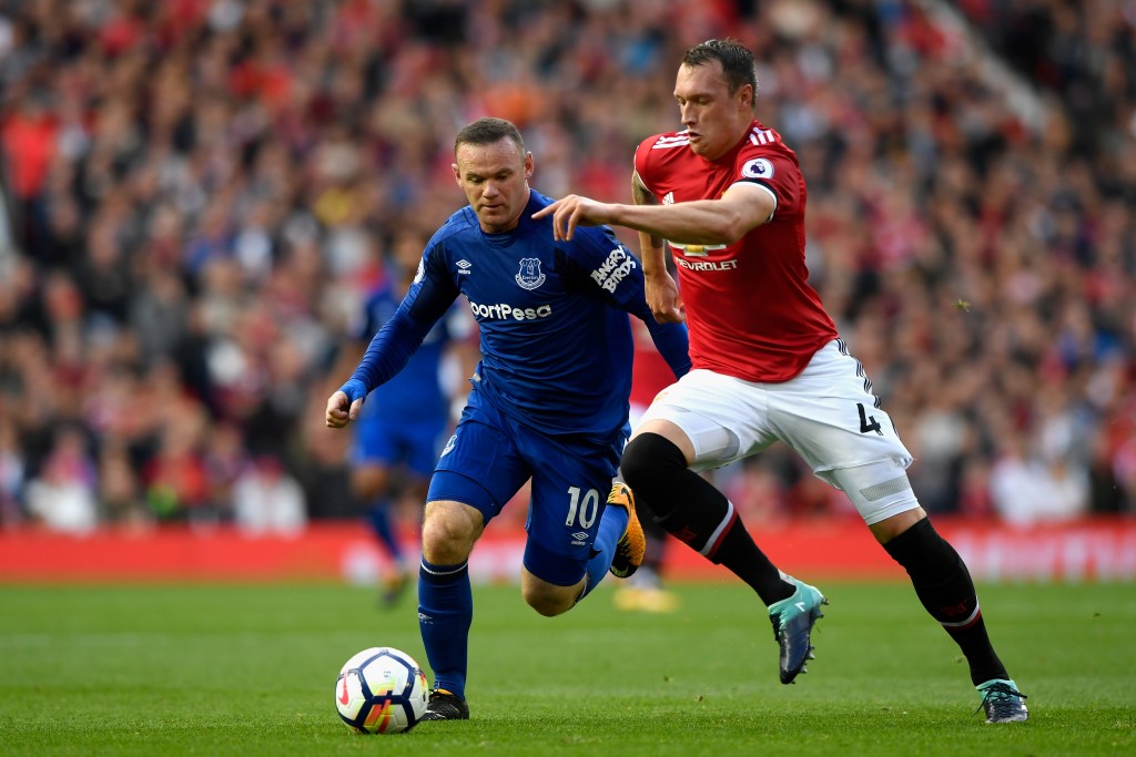 MANCHESTER, ENGLAND - SEPTEMBER 17: Wayne Rooney of Everton and Phil Jones of Manchester United battle for possession during the Premier League match between Manchester United and Everton at Old Trafford on September 17, 2017 in Manchester, England. (Photo by Stu Forster/Getty Images)