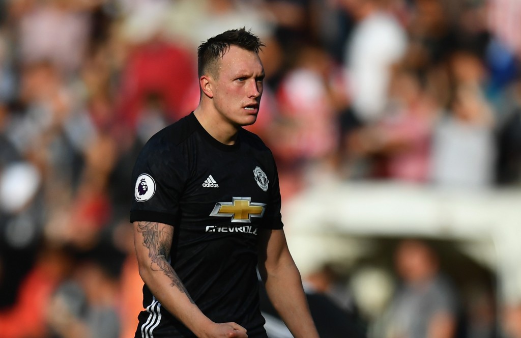 SOUTHAMPTON, ENGLAND - SEPTEMBER 23: Phil Jones (C) and Chris Smalling (L) of Manchester United celeberate their victory in the Premier League match between Southampton and Manchester United at St Mary's Stadium on September 23, 2017 in Southampton, England. (Photo by Dan Mullan/Getty Images)