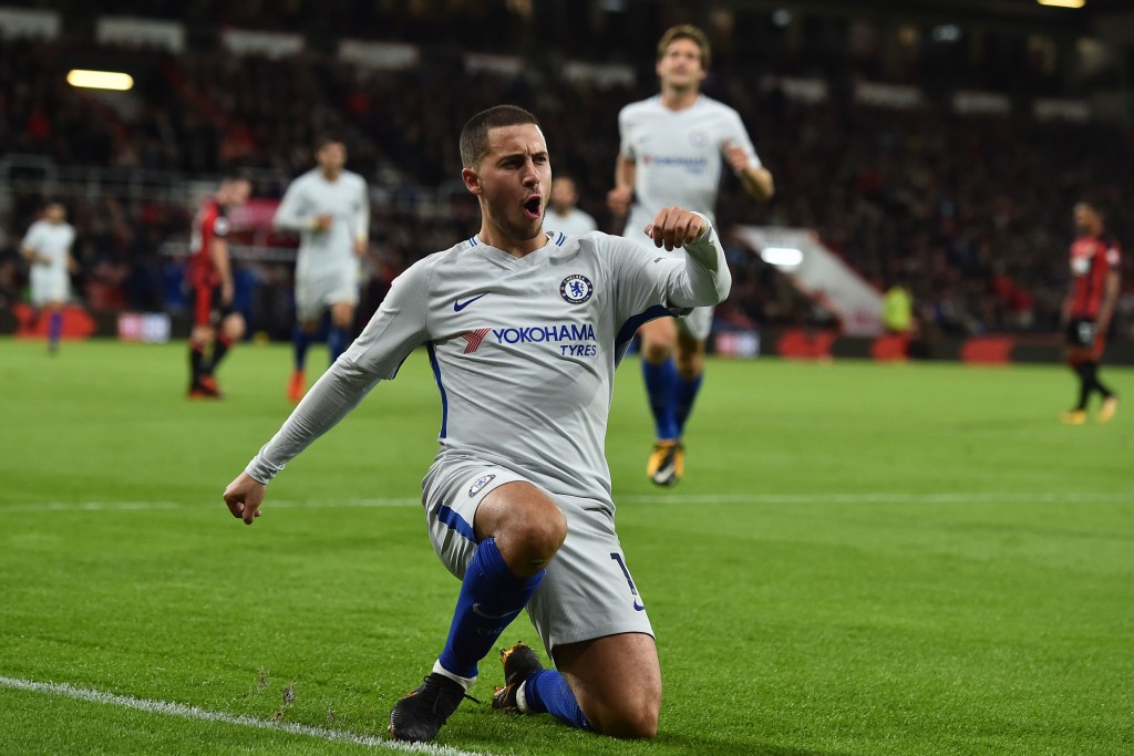 Chelsea's Belgian midfielder Eden Hazard celebrates after scoring the opening goal of the English Premier League football match between Bournemouth and Chelsea at the Vitality Stadium in Bournemouth, southern England on October 28, 2017. / AFP PHOTO / Glyn KIRK / RESTRICTED TO EDITORIAL USE. No use with unauthorized audio, video, data, fixture lists, club/league logos or 'live' services. Online in-match use limited to 75 images, no video emulation. No use in betting, games or single club/league/player publications. / (Photo credit should read GLYN KIRK/AFP/Getty Images)