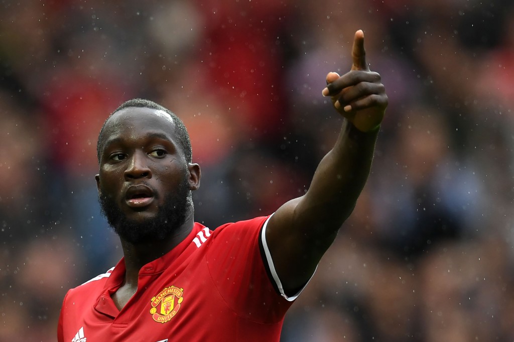 Manchester United's Belgian striker Romelu Lukaku celebrates scoring the team's fourth goal during the English Premier League football match between Manchester United and Crystal Palace at Old Trafford in Manchester, north west England, on September 30, 2017. / AFP PHOTO / Paul ELLIS / RESTRICTED TO EDITORIAL USE. No use with unauthorized audio, video, data, fixture lists, club/league logos or 'live' services. Online in-match use limited to 75 images, no video emulation. No use in betting, games or single club/league/player publications. / (Photo credit should read PAUL ELLIS/AFP/Getty Images)