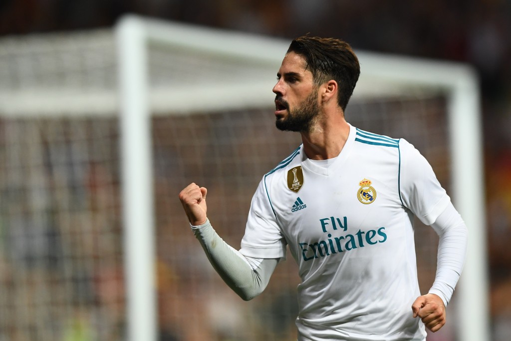 Real Madrid's midfielder Isco celebrates his second goal during the Spanish league football match Real Madrid CF vs RCD Espanyol at the Santiago Bernabeu stadium in Madrid on October 1, 2017. / AFP PHOTO / GABRIEL BOUYS (Photo credit should read GABRIEL BOUYS/AFP/Getty Images)