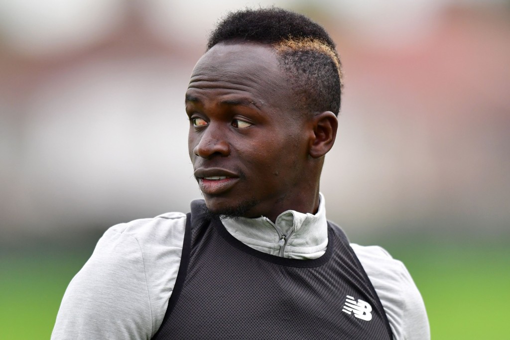 Liverpool's Senegalese midfielder Sadio Mane attends a team training session at the club's Melwood training complex in Liverpool, north west England, on September 12, 2017 , on the eve of their Champions League Group E football match against Sevilla. / AFP PHOTO / Anthony Devlin (Photo credit should read ANTHONY DEVLIN/AFP/Getty Images)