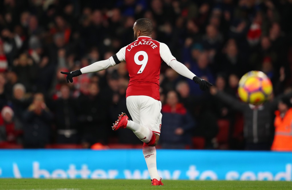 LONDON, ENGLAND - NOVEMBER 29: Alexandre Lacazette of Arsenal celebrates scoring his sides first goal during the Premier League match between Arsenal and Huddersfield Town at Emirates Stadium on November 29, 2017 in London, England. (Photo by Catherine Ivill/Getty Images)