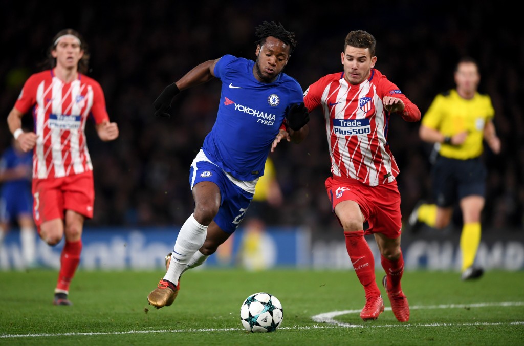 LONDON, ENGLAND - DECEMBER 05: Michy Batshuayi of Chelsea is challenged by Lucas Hernandez of Atletico Madrid during the UEFA Champions League group C match between Chelsea FC and Atletico Madrid at Stamford Bridge on December 5, 2017 in London, United Kingdom. (Photo by Shaun Botterill/Getty Images)