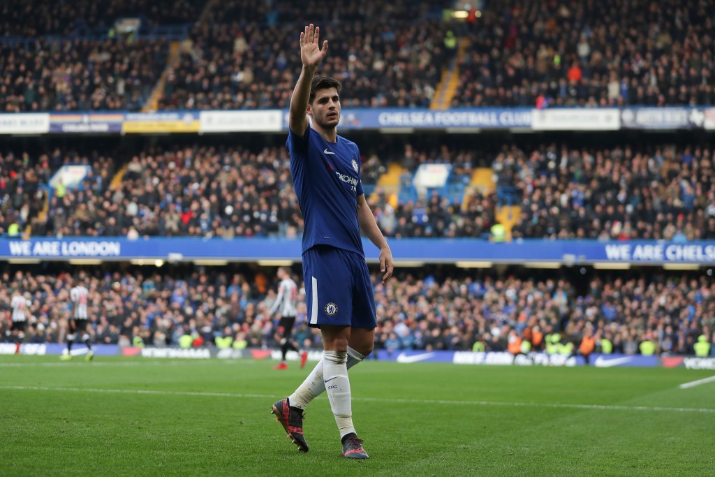 Chelsea's Spanish striker Alvaro Morata celebrates scoring his team's second goal during the English Premier League football match between Chelsea and Newcastle United at Stamford Bridge in London on December 2, 2017. / AFP PHOTO / Daniel LEAL-OLIVAS / RESTRICTED TO EDITORIAL USE. No use with unauthorized audio, video, data, fixture lists, club/league logos or 'live' services. Online in-match use limited to 75 images, no video emulation. No use in betting, games or single club/league/player publications. / (Photo credit should read DANIEL LEAL-OLIVAS/AFP/Getty Images)