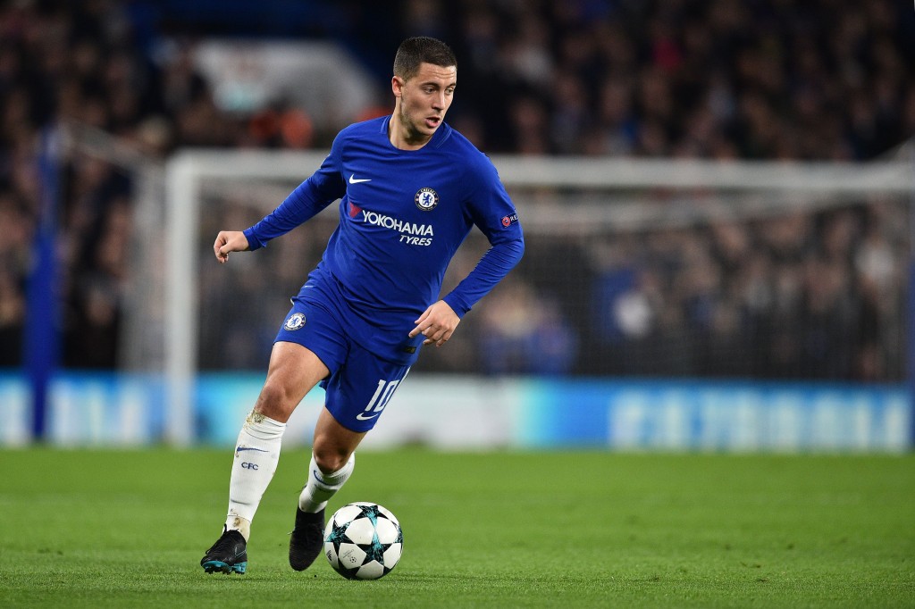 Chelsea's Belgian midfielder Eden Hazard runs with the ball during a UEFA Champions League Group C football match between Chelsea and Atletico Madrid at Stamford Bridge in London on December 5, 2017. / AFP PHOTO / Glyn KIRK (Photo credit should read GLYN KIRK/AFP/Getty Images)
