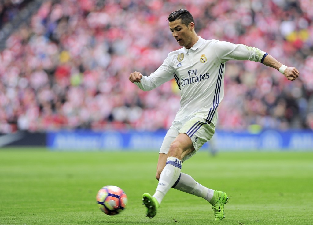 Real Madrid's Portuguese forward Cristiano Ronaldo kicks the ball during the Spanish league football match Athletic Club Bilbao vs Real Madrid CF at the San Mames stadium in Bilbao on March 18, 2017. / AFP PHOTO / ANDER GILLENEA (Photo credit should read ANDER GILLENEA/AFP/Getty Images)