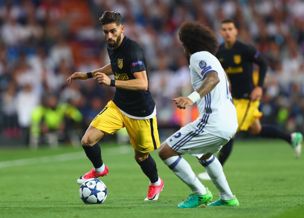 MADRID, SPAIN - MAY 02: Yannick Ferreira Carrasco of Atletico Madrid is faced by Marcelo of Real Madrid during the UEFA Champions League semi final first leg match between Real Madrid CF and Club Atletico de Madrid at Estadio Santiago Bernabeu on May 2, 2017 in Madrid, Spain. (Photo by Clive Rose/Getty Images)