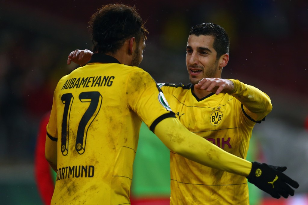 STUTTGART, GERMANY - FEBRUARY 09: Henrikh Mkhitaryan (R) of Dortmund celebrates his team's third goal with team mate Pierre-Emerick Aubameyang during the DFB Cup Quarter Final match between VfB Stuttgart and Borussia Dortmund at Mercedes-Benz Arena on February 9, 2016 in Stuttgart, Germany. (Photo by Alex Grimm/Bongarts/Getty Images)