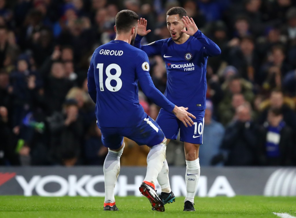 LONDON, ENGLAND - FEBRUARY 12: Eden Hazard of Chelsea celebrates after scoring his sides first goal with Olivier Giroud of Chelsea during the Premier League match between Chelsea and West Bromwich Albion at Stamford Bridge on February 12, 2018 in London, England. (Photo by Julian Finney/Getty Images)