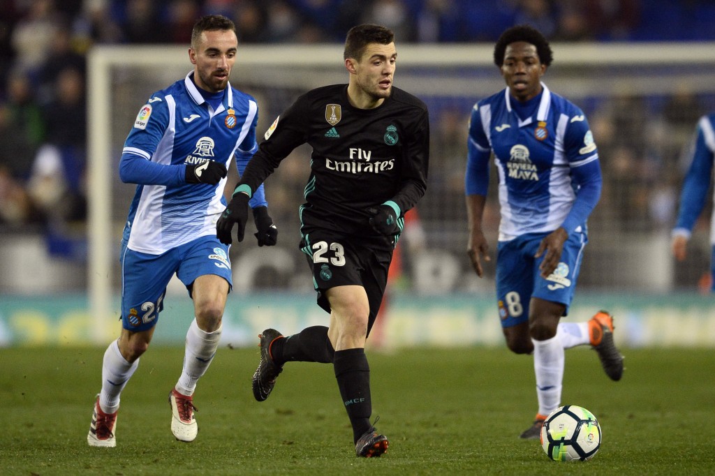 Real Madrid's Croatian midfielder Mateo Kovacic (C) vies with Espanyol's Spanish midfielder Darder (L) and Espanyol's Colombian midfielder Carlos Sanchez during the Spanish league football match between RCD Espanyol and Real Madrid CF at the RCDE Stadium in Cornella de Llobregat on February 27, 2018. / AFP PHOTO / Josep LAGO (Photo credit should read JOSEP LAGO/AFP/Getty Images)