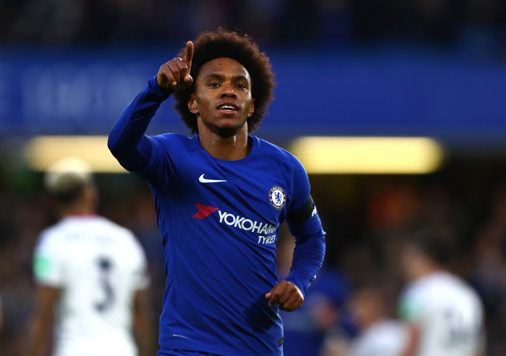 LONDON, ENGLAND - MARCH 10: Willian of Chelsea celebrates after scoring his sides first goal during the Premier League match between Chelsea and Crystal Palace at Stamford Bridge on March 10, 2018 in London, England. (Photo by Clive Rose/Getty Images)