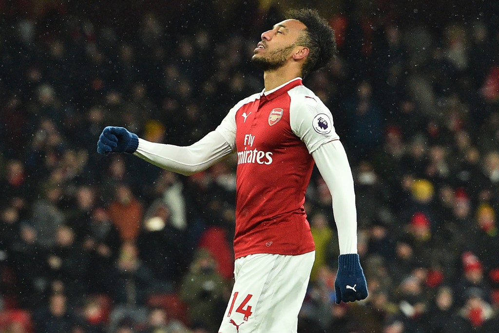 Arsenal's Gabonese striker Pierre-Emerick Aubameyang reacts after having his penalty saved by Manchester City's Brazilian goalkeeper Ederson (not pictured) during the English Premier League football match between Arsenal and Manchester City at the Emirates Stadium in London on March 1, 2018. / AFP PHOTO / Glyn KIRK / RESTRICTED TO EDITORIAL USE. No use with unauthorized audio, video, data, fixture lists, club/league logos or 'live' services. Online in-match use limited to 75 images, no video emulation. No use in betting, games or single club/league/player publications. / (Photo credit should read GLYN KIRK/AFP/Getty Images)
