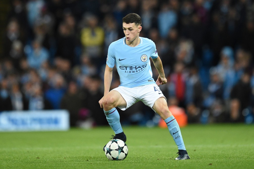 Manchester City's English midfielder Phil Foden controls the ball during the UEFA Champions League Group F football match between Manchester City and Feyenoord at the Etihad Stadium in Manchester, north west England, on November 21, 2017. / AFP PHOTO / Oli SCARFF (Photo credit should read OLI SCARFF/AFP/Getty Images)