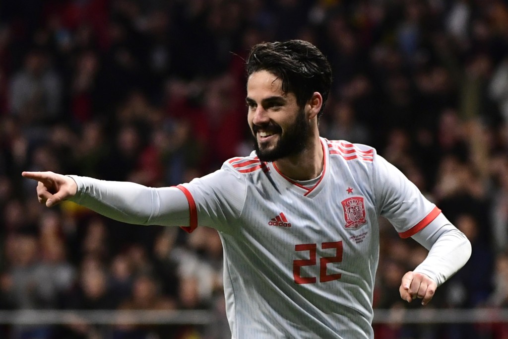Spain's midfielder Isco celebrates after scoring his team's third goal during a friendly football match between Spain and Argentina at the Wanda Metropolitano Stadium in Madrid on March 27, 2018. / AFP PHOTO / PIERRE-PHILIPPE MARCOU (Photo credit should read PIERRE-PHILIPPE MARCOU/AFP/Getty Images)