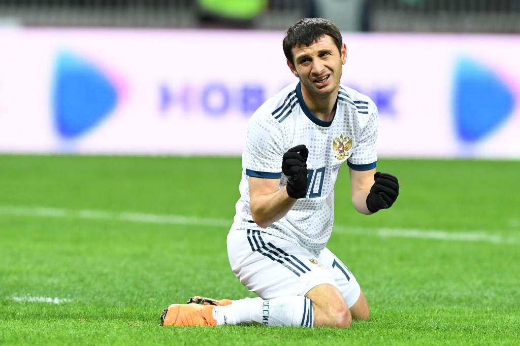 Russia's midfielder Alan Dzagoev reacts during an international friendly football match between Russia and Brazil at the Luzhniki stadium in Moscow on March 23, 2018. / AFP PHOTO / Kirill KUDRYAVTSEV (Photo credit should read KIRILL KUDRYAVTSEV/AFP/Getty Images)