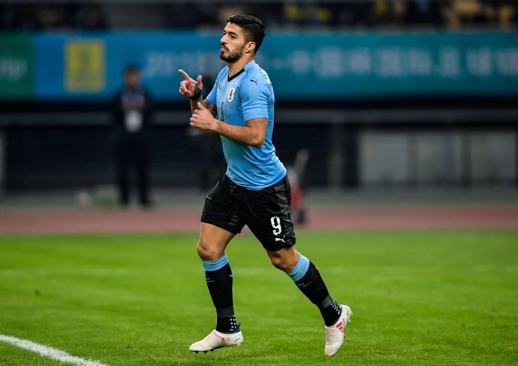 Luis Suarez of Uruguay reacts during their China Cup International Football Championship Semi-final match against Czech in Nanning in China's southern Guangxi region on March 23, 2018. / AFP PHOTO / - / China OUT (Photo credit should read -/AFP/Getty Images)