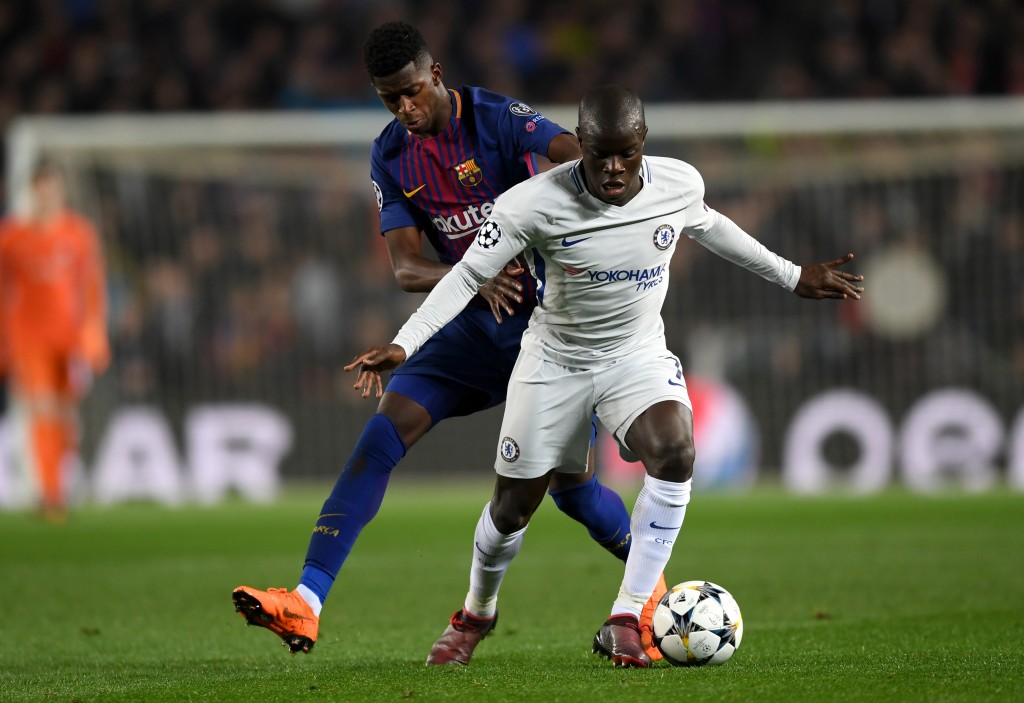 BARCELONA, SPAIN - MARCH 14: N'Golo Kante of Chelsea shields the ball from Ousmane Dembele of Barcelona during the UEFA Champions League Round of 16 Second Leg match FC Barcelona and Chelsea FC at Camp Nou on March 14, 2018 in Barcelona, Spain. (Photo by Shaun Botterill/Getty Images)