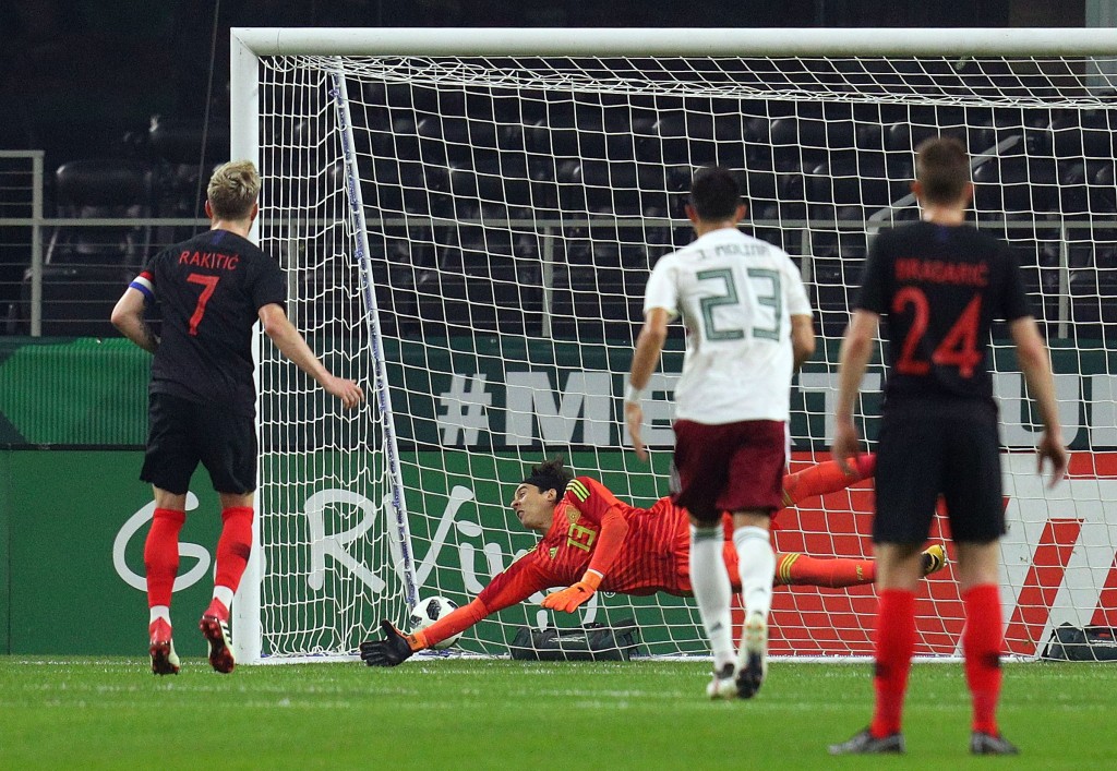 Rakitic's penalty proved to be the winner (Photo by Richard Rodriguez/Getty Images)
