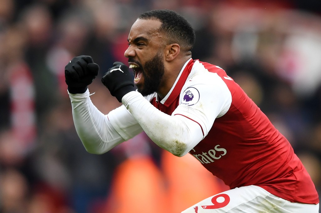LONDON, ENGLAND - APRIL 01: Alexandre Lacazette of Arsenal celebrates after scoring his sides third goal during the Premier League match between Arsenal and Stoke City at Emirates Stadium on April 1, 2018 in London, England. (Photo by Shaun Botterill/Getty Images)