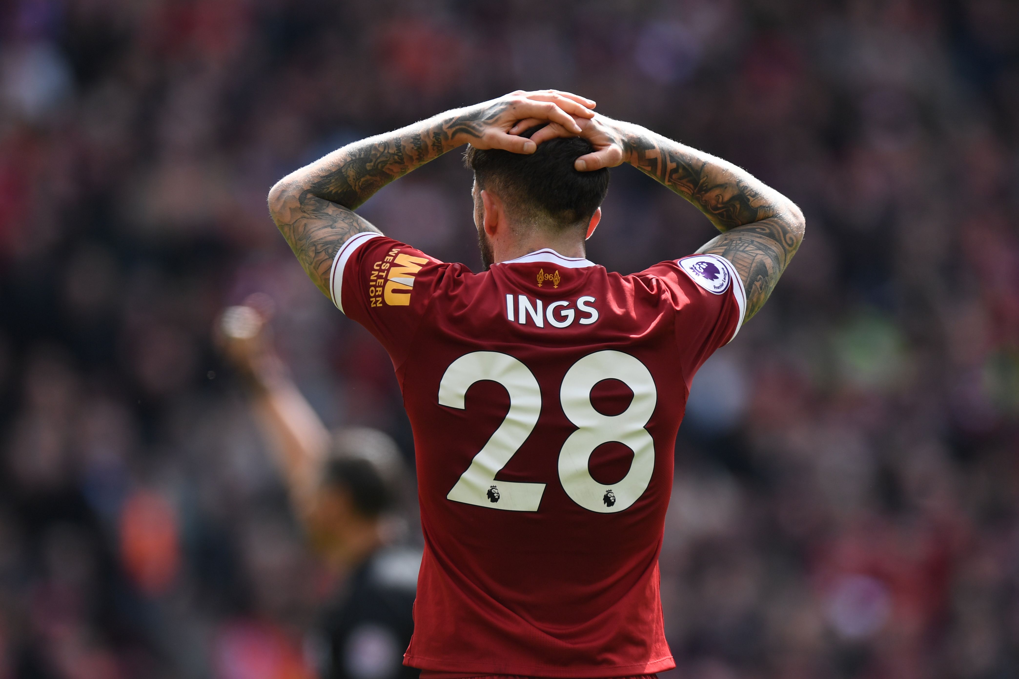 Liverpool's English striker Danny Ings reacts to his shot at goal ruled off-side during the English Premier League football match between Liverpool and Stoke City at Anfield in Liverpool, north west England on April 28, 2018. (Photo by Paul ELLIS / AFP) / RESTRICTED TO EDITORIAL USE. No use with unauthorized audio, video, data, fixture lists, club/league logos or 'live' services. Online in-match use limited to 75 images, no video emulation. No use in betting, games or single club/league/player publications. / (Photo credit should read PAUL ELLIS/AFP/Getty Images)