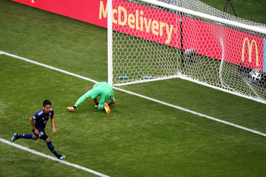 Kagawa was his usual self for Japan. (Picture Courtesy - AFP/Getty Images)