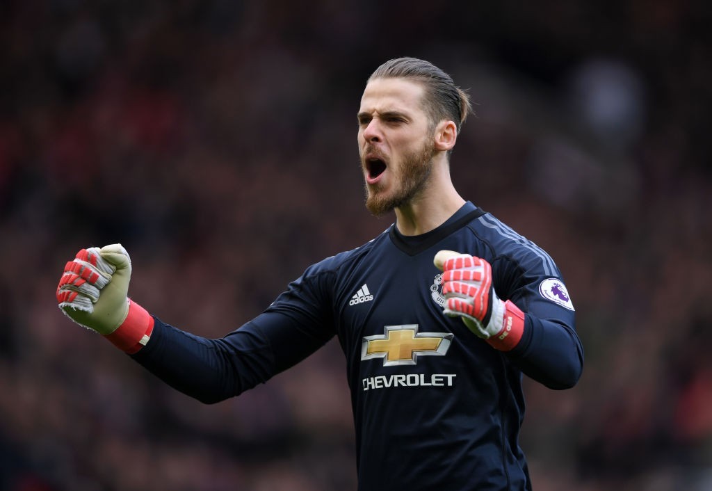MANCHESTER, ENGLAND - APRIL 29: David De Gea of Manchester United celebrates his sides first goal during the Premier League match between Manchester United and Arsenal at Old Trafford on April 29, 2018 in Manchester, England. (Photo by Shaun Botterill/Getty Images)