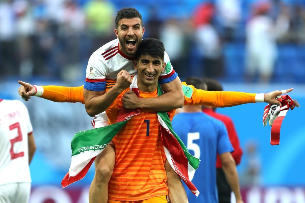 Alireza Beiranvand celebrates after Iran won their opening game of Group B. (Photo courtesy: AFP/Getty)