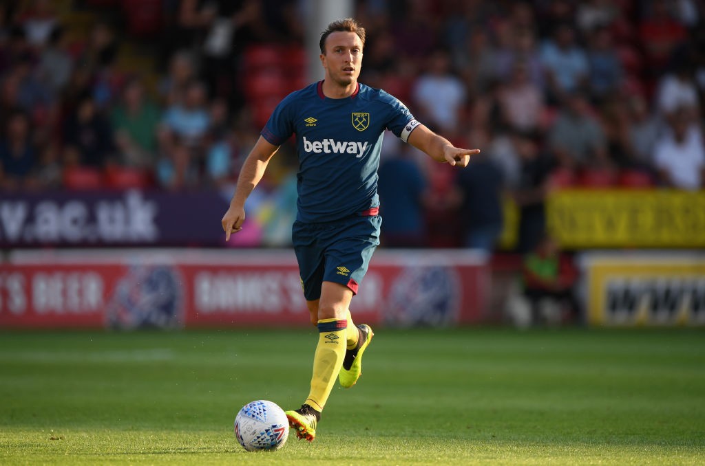 West Ham Captain, Mark Noble is set to miss the Arsenal clash with a back injury. (Photo courtesy: AFP/Getty)