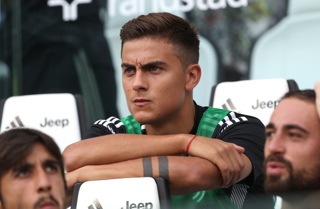 Dybala cuts an unhappy figure after being left on the bench against Lazio. (Photo courtesy: AFP/Getty)