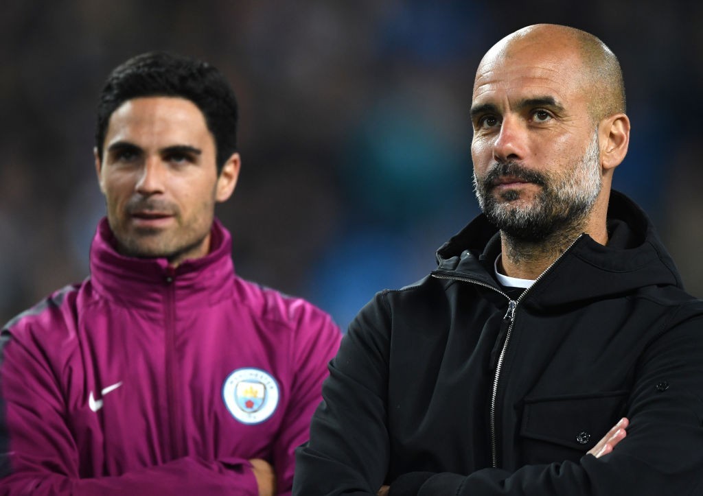 MANCHESTER, ENGLAND - MAY 09: Mikel Arteta and Josep Guardiola, Manager of Manchester City looks on during the Premier League match between Manchester City and Brighton and Hove Albion at Etihad Stadium on May 9, 2018 in Manchester, England. (Photo by Gareth Copley/Getty Images)