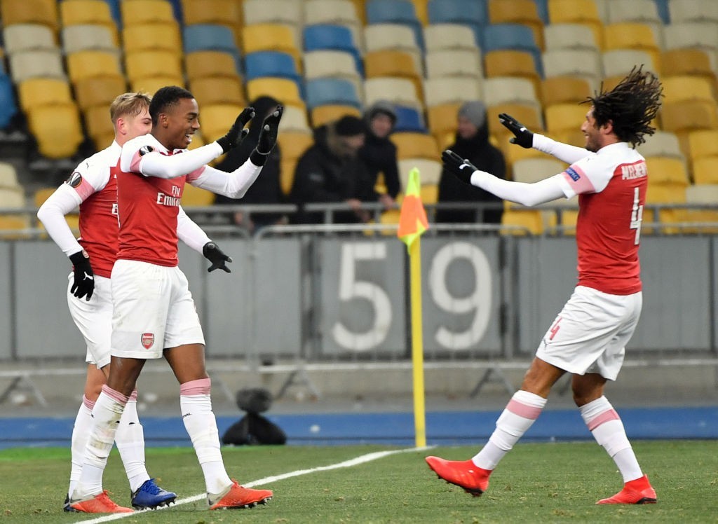 Joe Willock celebrates his first goal for the senior side. (Photo by Sergei Supinsky/AFP/Getty Images)