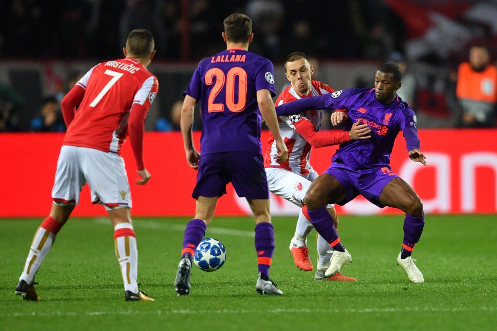 Lallana and Wijnaldu, struggled (Photo by ANDREJ ISAKOVIC/AFP/Getty Images)