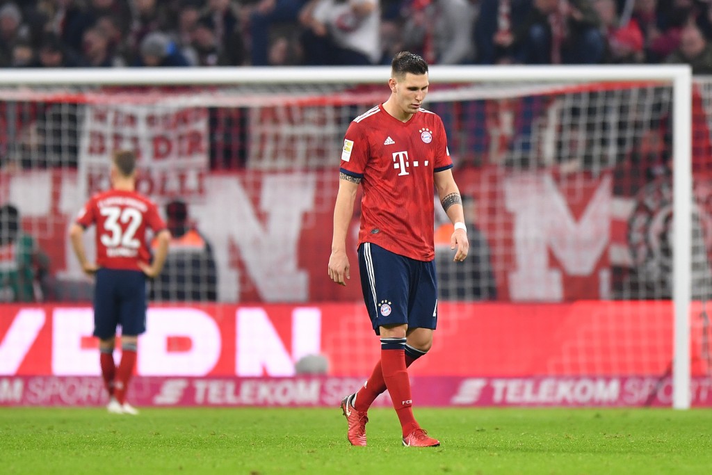 MUNICH, GERMANY - NOVEMBER 24: Niklas Suele of Bayern Muenchen looks down after the Bundesliga match between FC Bayern Muenchen and Fortuna Duesseldorf at Allianz Arena on November 24, 2018 in Munich, Germany. (Photo by Sebastian Widmann/Bongarts/Getty Images)