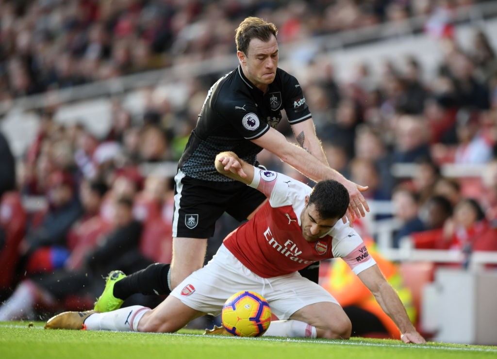 Sokratis wrestles with Ashley Barnes in Arsenal's win over Burnley. (Photo courtesy: AFP/Getty)