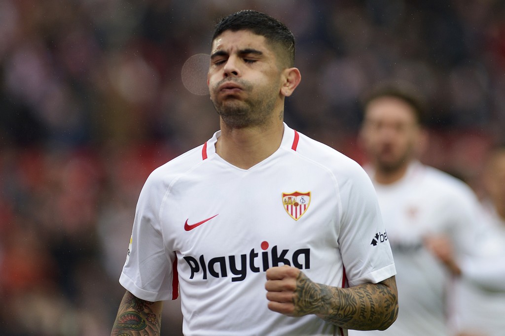 Sevilla's Argentinian midfielder Ever Banega celebrates after scoring a goal during the Spanish League football match between Sevilla and Girona at the Ramon Sanchez Pizjuan stadium in Sevilla on December 16, 2018. (Photo by CRISTINA QUICLER / AFP) (Photo credit should read CRISTINA QUICLER/AFP/Getty Images)