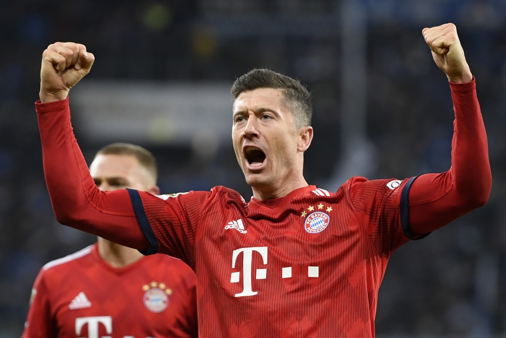 SINSHEIM, GERMANY - JANUARY 18: Robert Lewandowski of Bayern Munich celebrates scoring the 3rd Bayern Munich goal during the Bundesliga match between TSG 1899 Hoffenheim and FC Bayern Muenchen at Wirsol Rhein-Neckar-Arena on January 18, 2019 in Sinsheim, Germany. (Photo by Matthias Hangst/Bongarts/Getty Images)