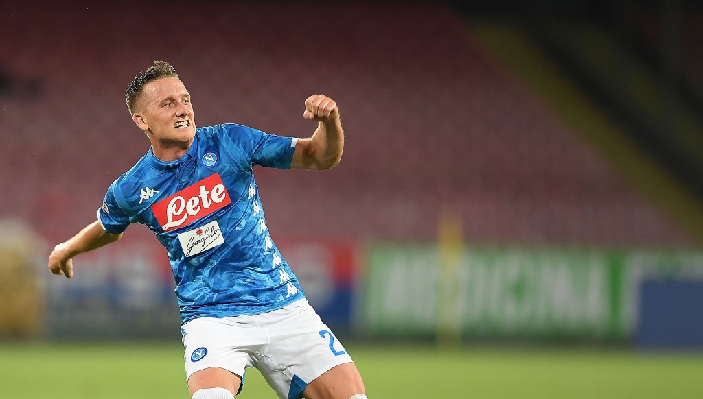 NAPLES, ITALY - AUGUST 25: Piotr Zielinski of SSC Napoli celebrates after scoring the 2-2 goal during the serie A match between SSC Napoli and AC Milan at Stadio San Paolo on August 25, 2018 in Naples, Italy. (Photo by Francesco Pecoraro/Getty Images)