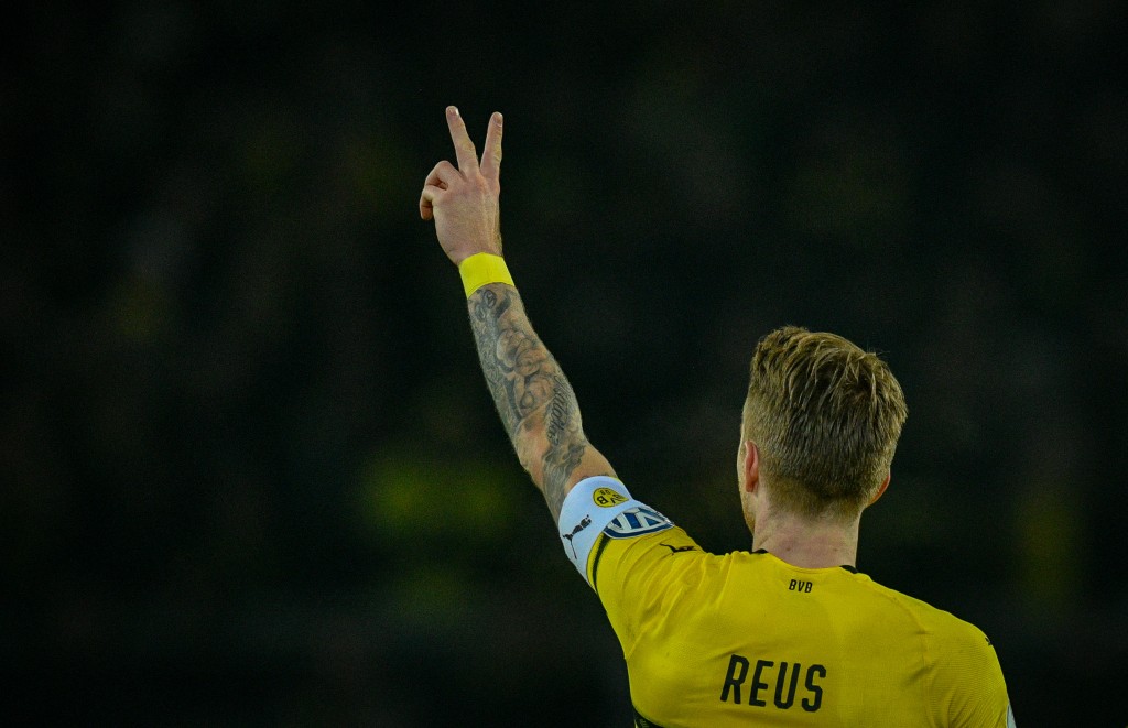 Dortmund's forward Marco Reus celebrate scoring the 1-1 equalizer during the German Cup (DFB Pokal) last 16 football match BVB Borussia Dortmund v Werder Bremen in Dortmund, western Germany on February 5, 2019. (Photo by SASCHA SCHUERMANN / AFP) / DFB REGULATIONS PROHIBIT ANY USE OF PHOTOGRAPHS AS IMAGE SEQUENCES AND QUASI-VIDEO. (Photo credit should read SASCHA SCHUERMANN/AFP/Getty Images)